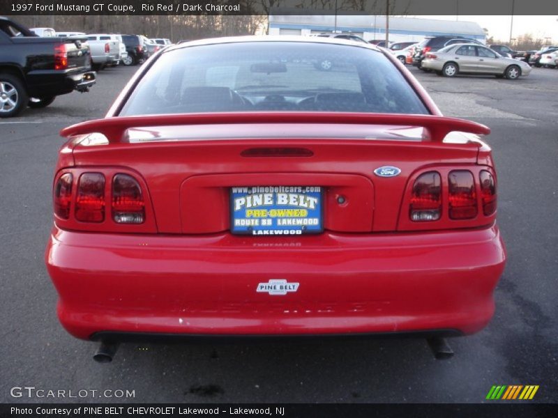 Rio Red / Dark Charcoal 1997 Ford Mustang GT Coupe