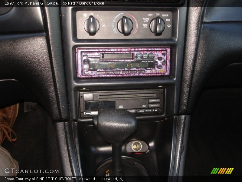 Rio Red / Dark Charcoal 1997 Ford Mustang GT Coupe