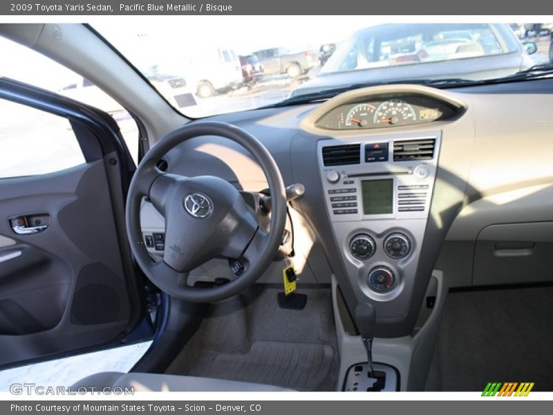 Pacific Blue Metallic / Bisque 2009 Toyota Yaris Sedan