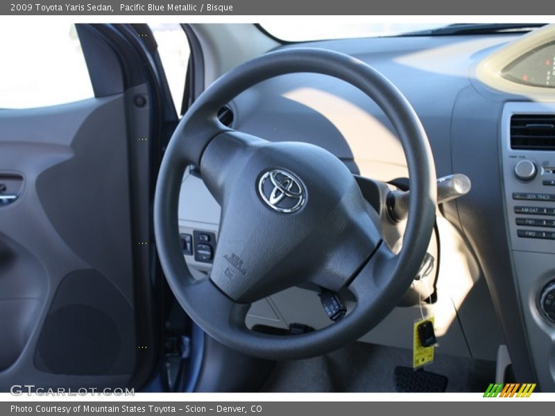 Pacific Blue Metallic / Bisque 2009 Toyota Yaris Sedan