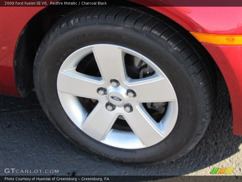 Redfire Metallic / Charcoal Black 2009 Ford Fusion SE V6