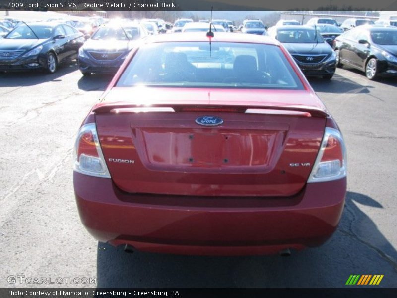 Redfire Metallic / Charcoal Black 2009 Ford Fusion SE V6