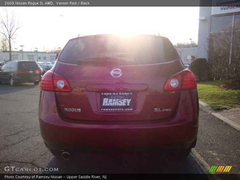 Venom Red / Black 2009 Nissan Rogue SL AWD