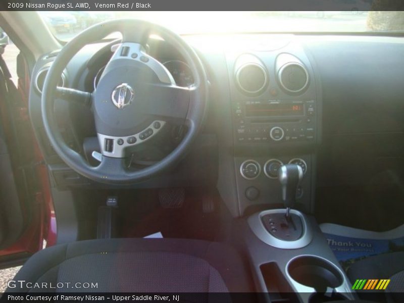 Venom Red / Black 2009 Nissan Rogue SL AWD