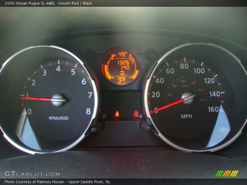 Venom Red / Black 2009 Nissan Rogue SL AWD