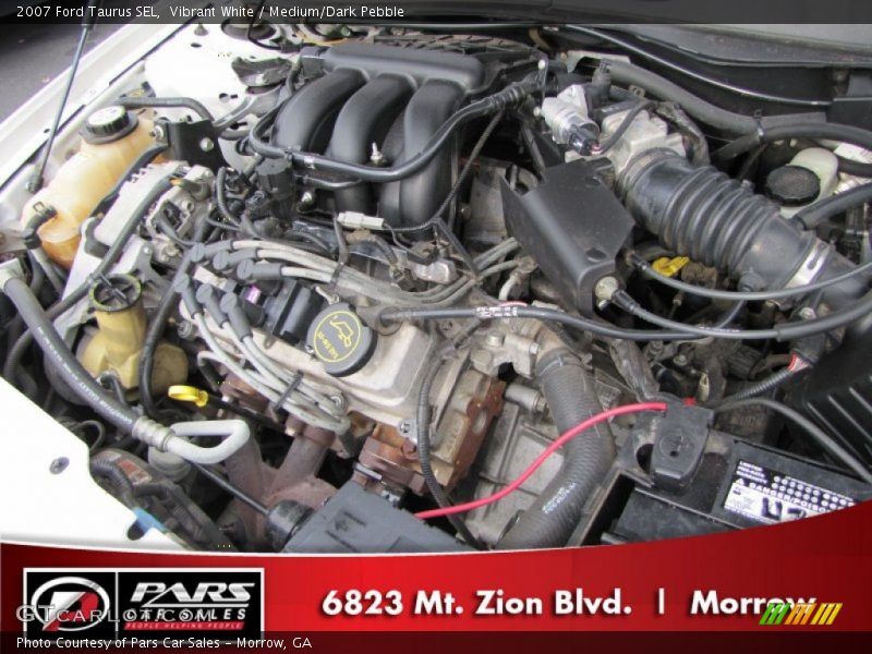 Vibrant White / Medium/Dark Pebble 2007 Ford Taurus SEL
