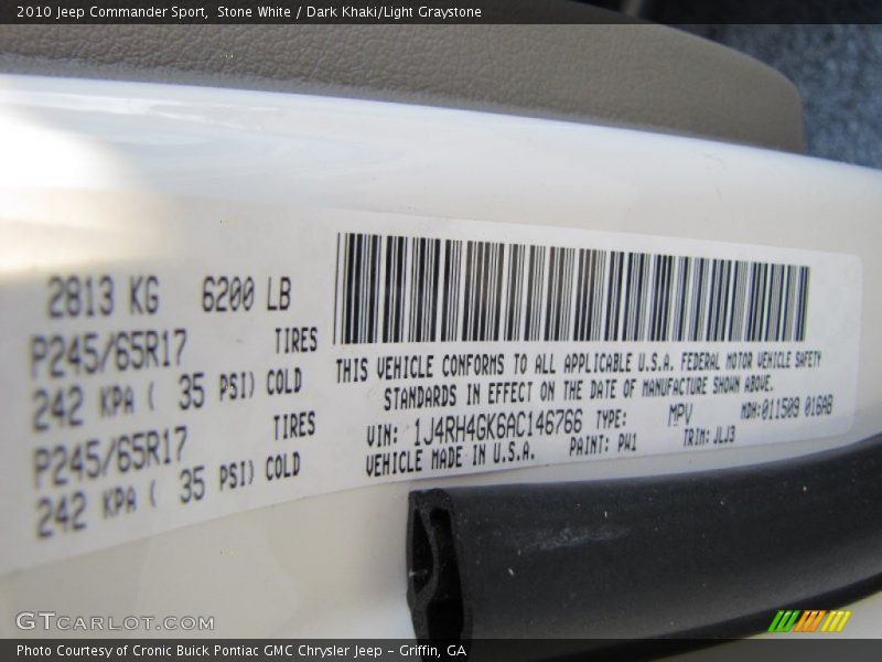 Stone White / Dark Khaki/Light Graystone 2010 Jeep Commander Sport