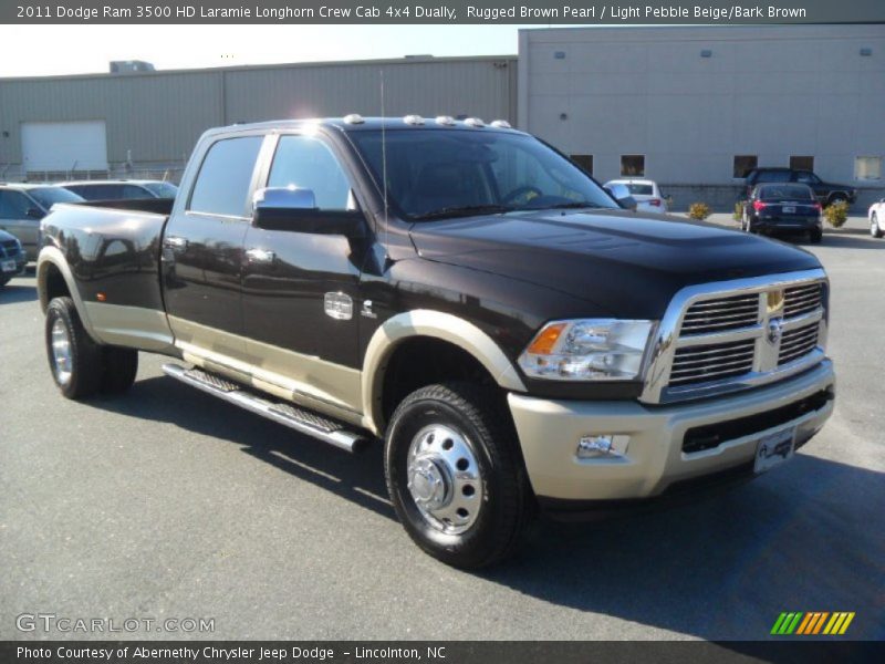 Front 3/4 View of 2011 Ram 3500 HD Laramie Longhorn Crew Cab 4x4 Dually