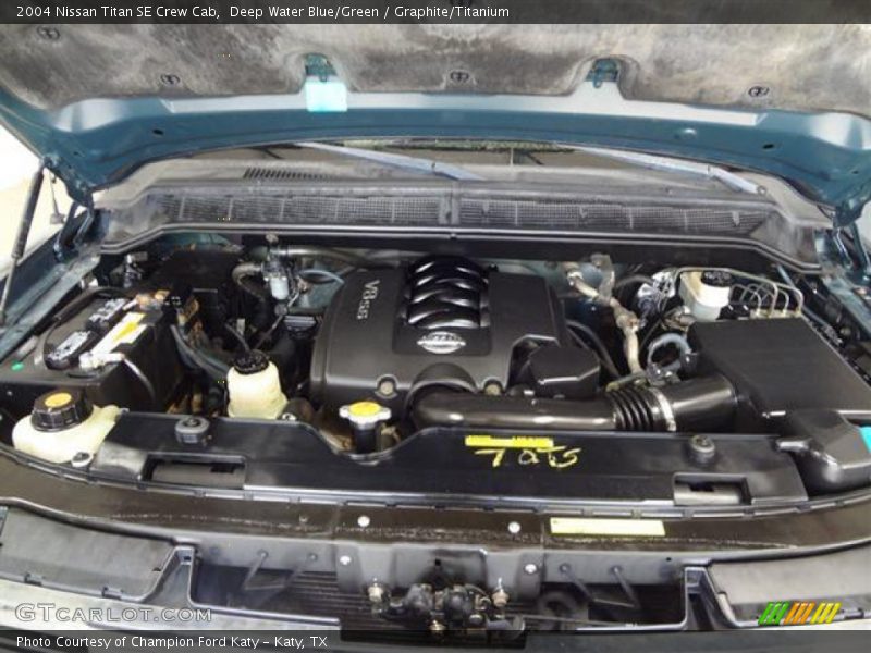 Deep Water Blue/Green / Graphite/Titanium 2004 Nissan Titan SE Crew Cab