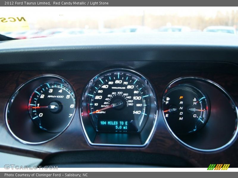 Red Candy Metallic / Light Stone 2012 Ford Taurus Limited
