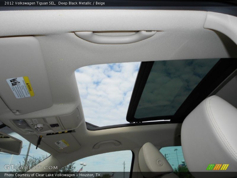 Deep Black Metallic / Beige 2012 Volkswagen Tiguan SEL