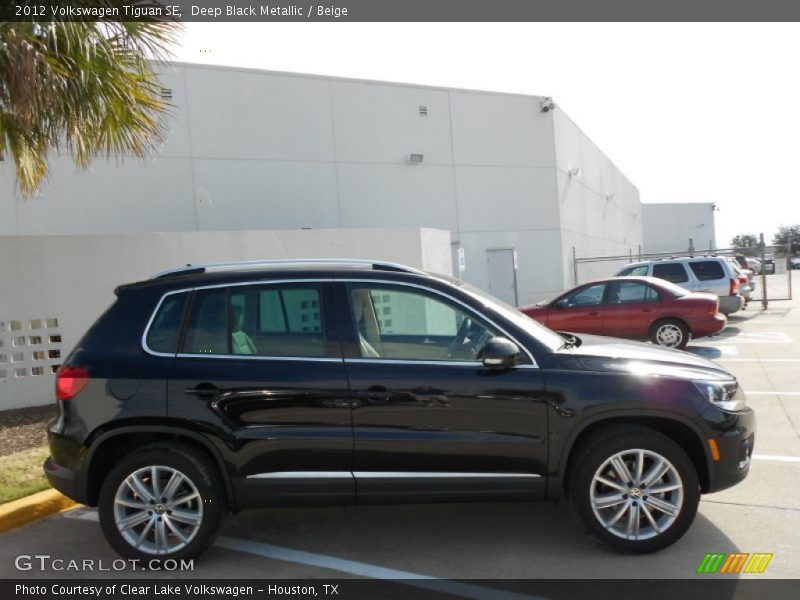 Deep Black Metallic / Beige 2012 Volkswagen Tiguan SE