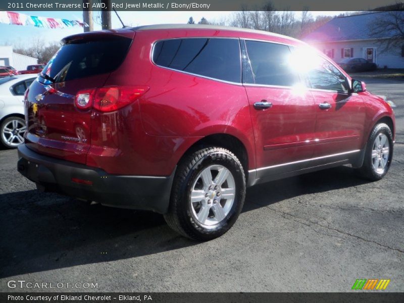 Red Jewel Metallic / Ebony/Ebony 2011 Chevrolet Traverse LT AWD