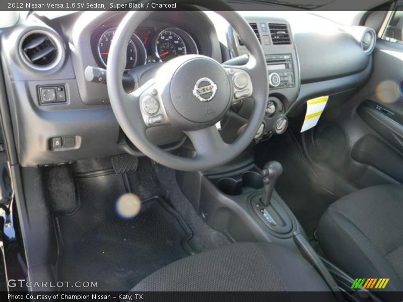 Super Black / Charcoal 2012 Nissan Versa 1.6 SV Sedan