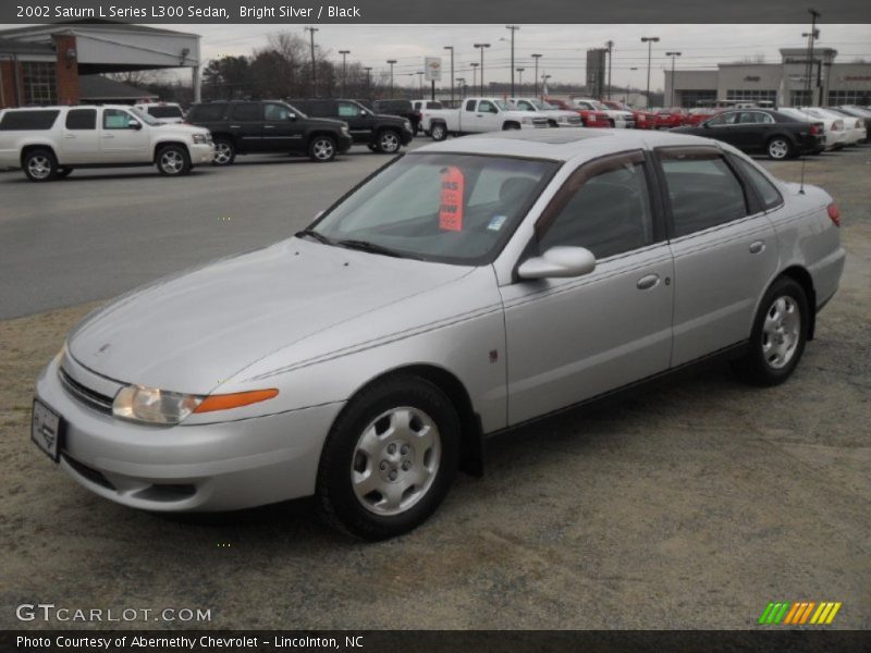 Bright Silver / Black 2002 Saturn L Series L300 Sedan