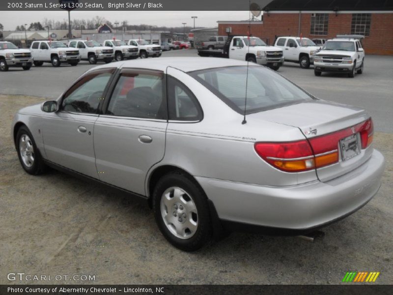 Bright Silver / Black 2002 Saturn L Series L300 Sedan