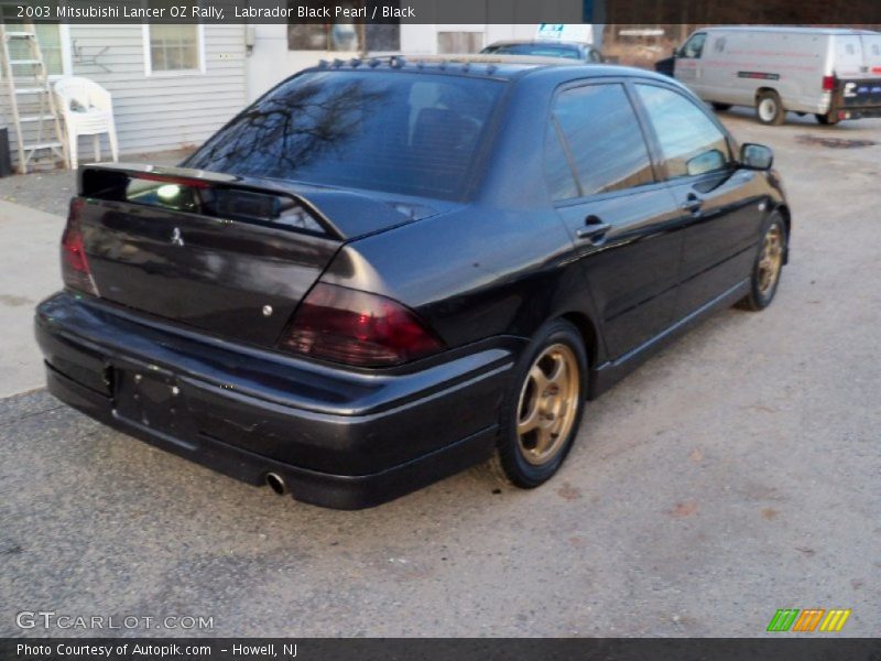 Labrador Black Pearl / Black 2003 Mitsubishi Lancer OZ Rally