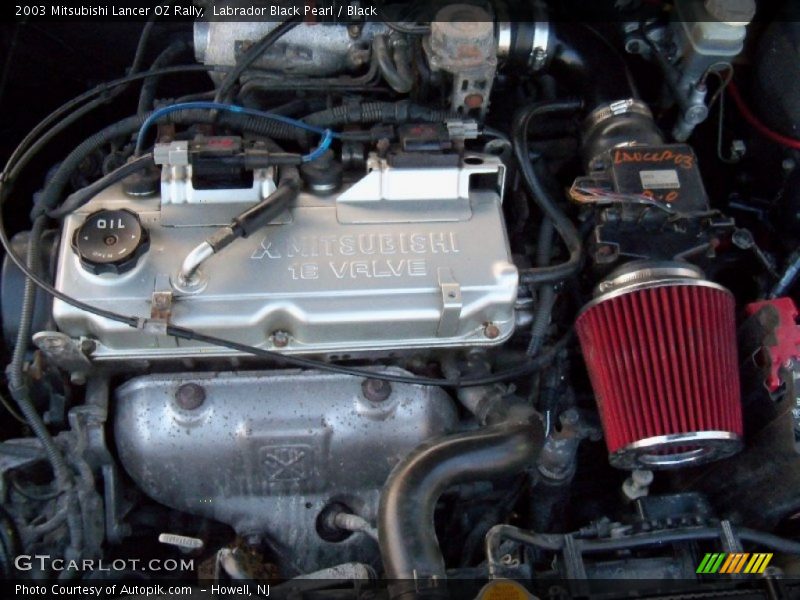 Labrador Black Pearl / Black 2003 Mitsubishi Lancer OZ Rally