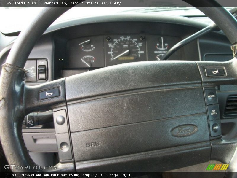 Dark Tourmaline Pearl / Gray 1995 Ford F150 XLT Extended Cab