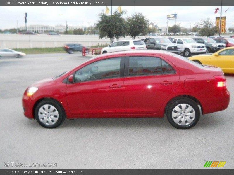 Barcelona Red Metallic / Bisque 2009 Toyota Yaris Sedan