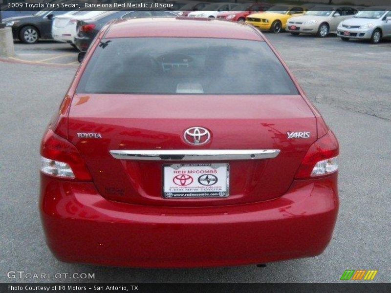 Barcelona Red Metallic / Bisque 2009 Toyota Yaris Sedan
