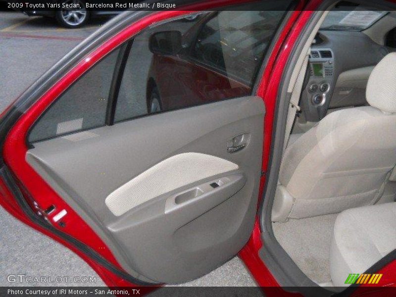 Barcelona Red Metallic / Bisque 2009 Toyota Yaris Sedan