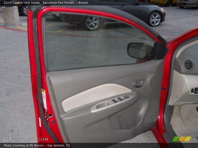Barcelona Red Metallic / Bisque 2009 Toyota Yaris Sedan