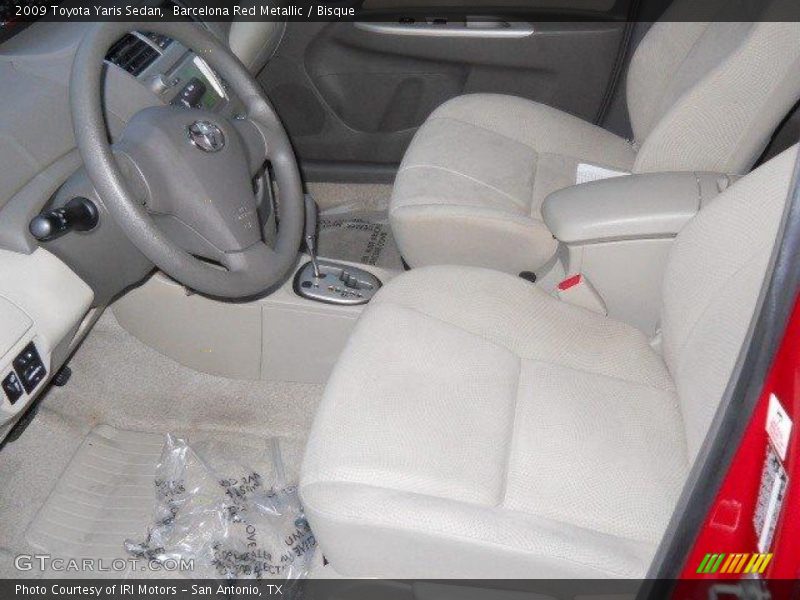 Barcelona Red Metallic / Bisque 2009 Toyota Yaris Sedan