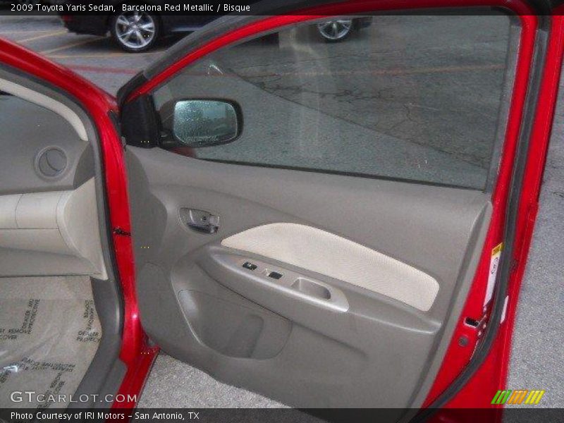 Barcelona Red Metallic / Bisque 2009 Toyota Yaris Sedan