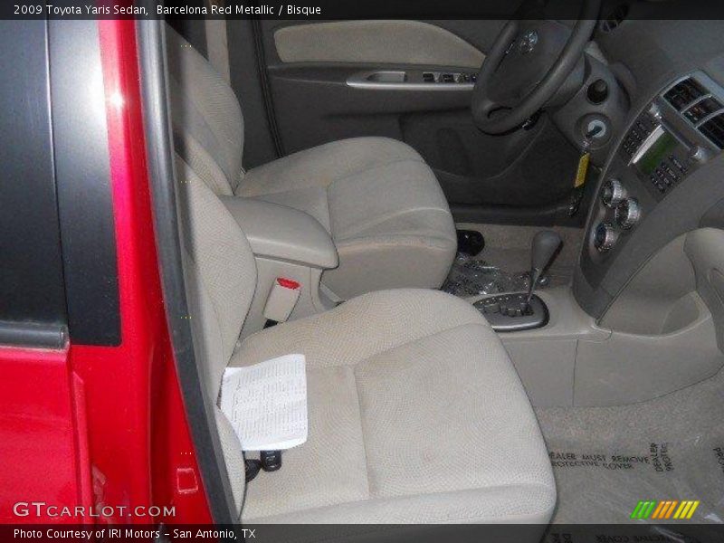 Barcelona Red Metallic / Bisque 2009 Toyota Yaris Sedan