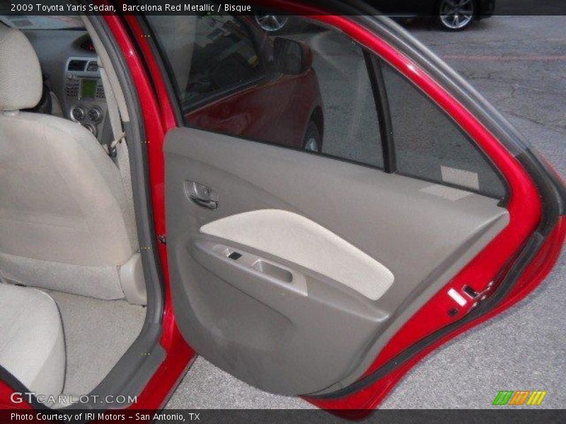 Barcelona Red Metallic / Bisque 2009 Toyota Yaris Sedan
