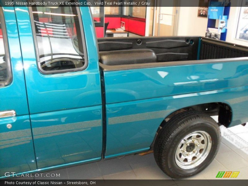 Vivid Teal Pearl Metallic / Gray 1995 Nissan Hardbody Truck XE Extended Cab