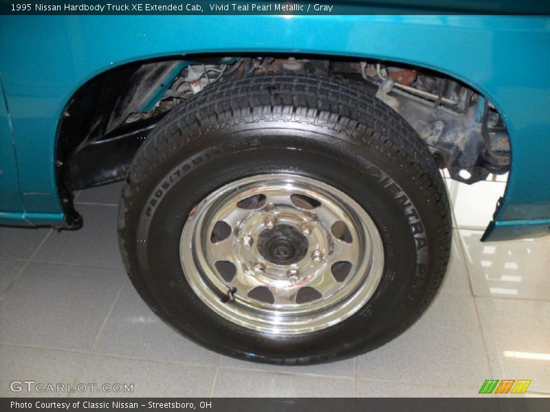 Vivid Teal Pearl Metallic / Gray 1995 Nissan Hardbody Truck XE Extended Cab