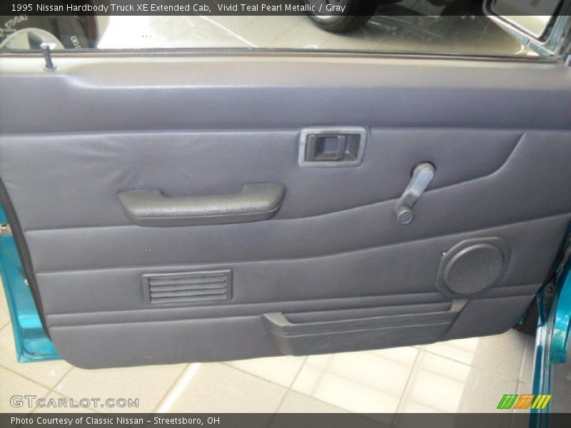 Vivid Teal Pearl Metallic / Gray 1995 Nissan Hardbody Truck XE Extended Cab