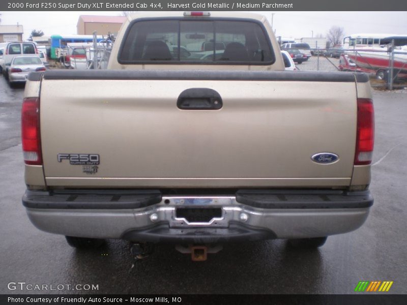 Harvest Gold Metallic / Medium Parchment 2000 Ford F250 Super Duty XLT Extended Cab 4x4