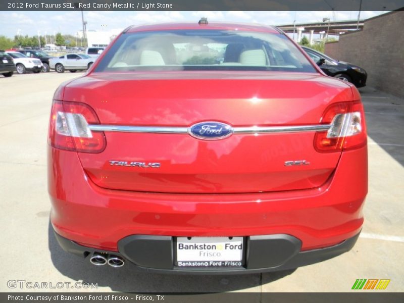 Red Candy Metallic / Light Stone 2012 Ford Taurus SEL