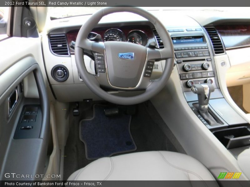 Red Candy Metallic / Light Stone 2012 Ford Taurus SEL