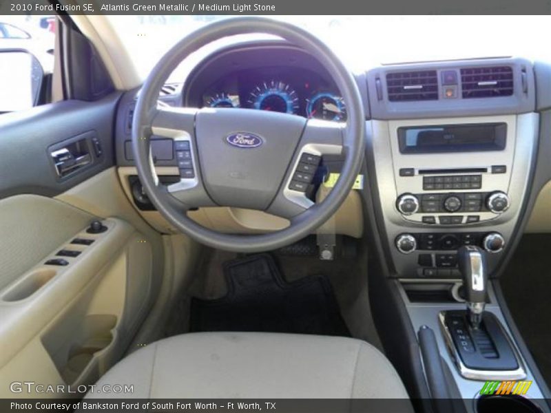 Atlantis Green Metallic / Medium Light Stone 2010 Ford Fusion SE