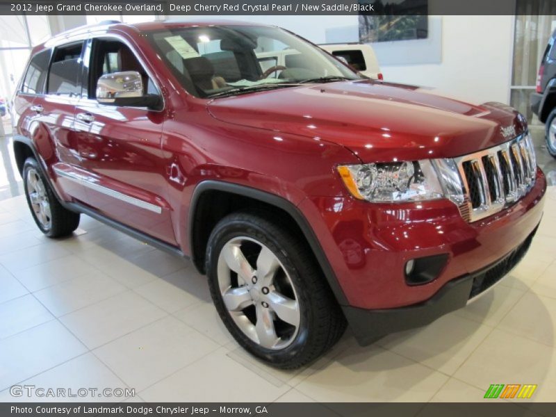 Deep Cherry Red Crystal Pearl / New Saddle/Black 2012 Jeep Grand Cherokee Overland
