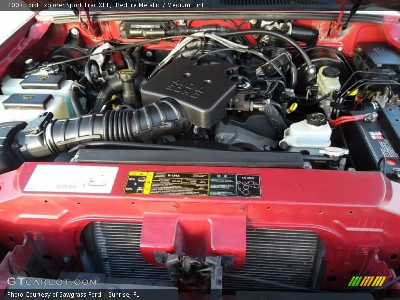 Redfire Metallic / Medium Flint 2003 Ford Explorer Sport Trac XLT