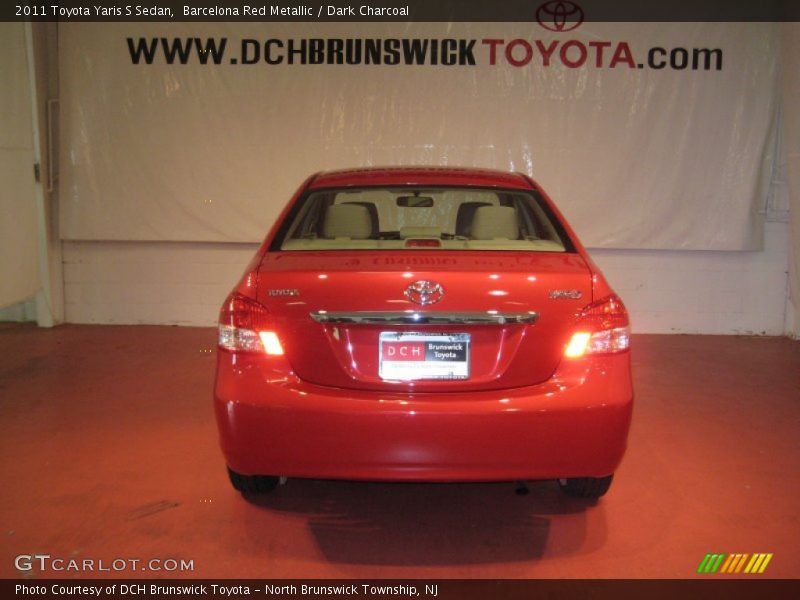 Barcelona Red Metallic / Dark Charcoal 2011 Toyota Yaris S Sedan