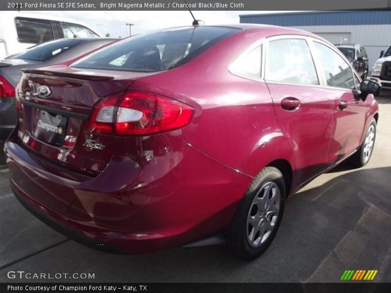 Bright Magenta Metallic / Charcoal Black/Blue Cloth 2011 Ford Fiesta SE SFE Sedan