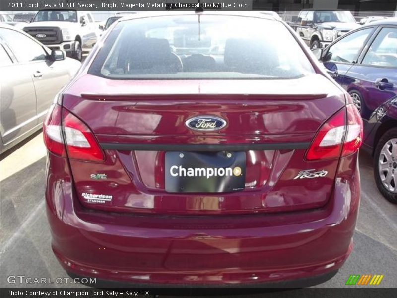 Bright Magenta Metallic / Charcoal Black/Blue Cloth 2011 Ford Fiesta SE SFE Sedan