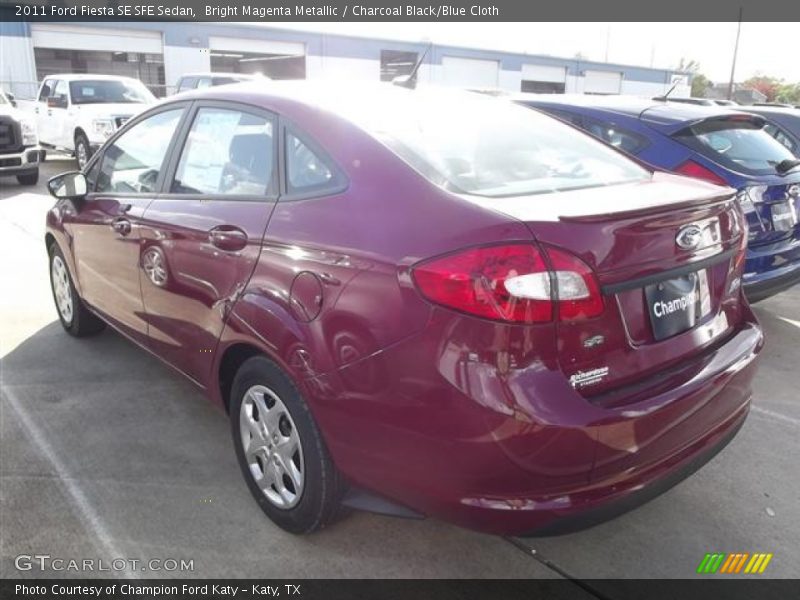 Bright Magenta Metallic / Charcoal Black/Blue Cloth 2011 Ford Fiesta SE SFE Sedan