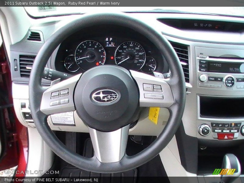 Ruby Red Pearl / Warm Ivory 2011 Subaru Outback 2.5i Wagon