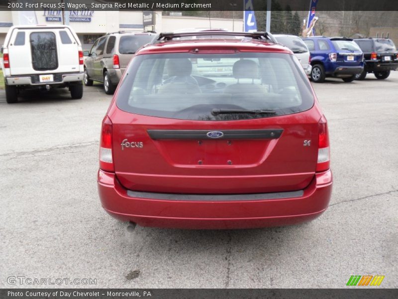 Sangria Red Metallic / Medium Parchment 2002 Ford Focus SE Wagon