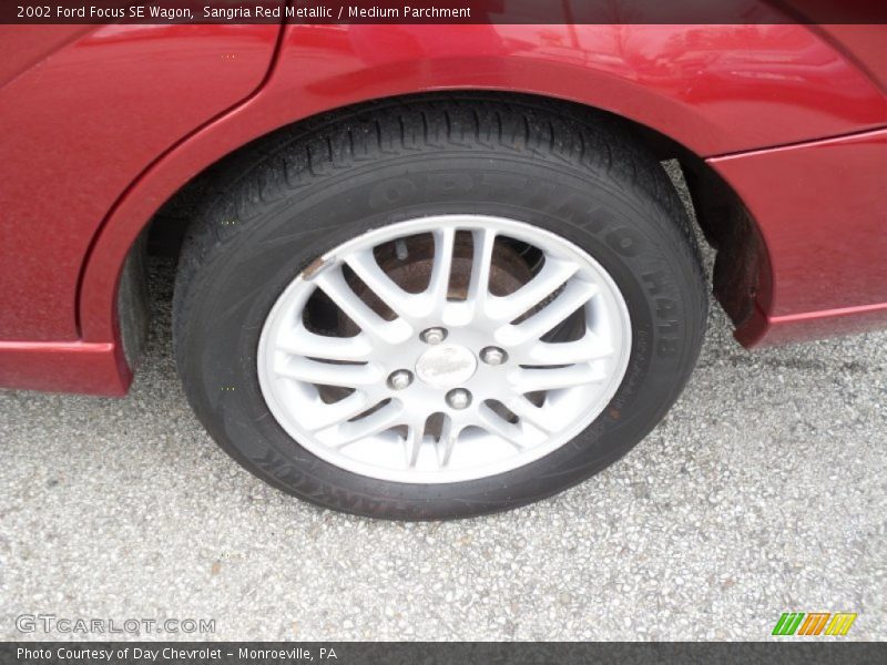 Sangria Red Metallic / Medium Parchment 2002 Ford Focus SE Wagon