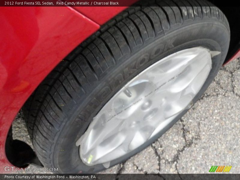 Red Candy Metallic / Charcoal Black 2012 Ford Fiesta SEL Sedan