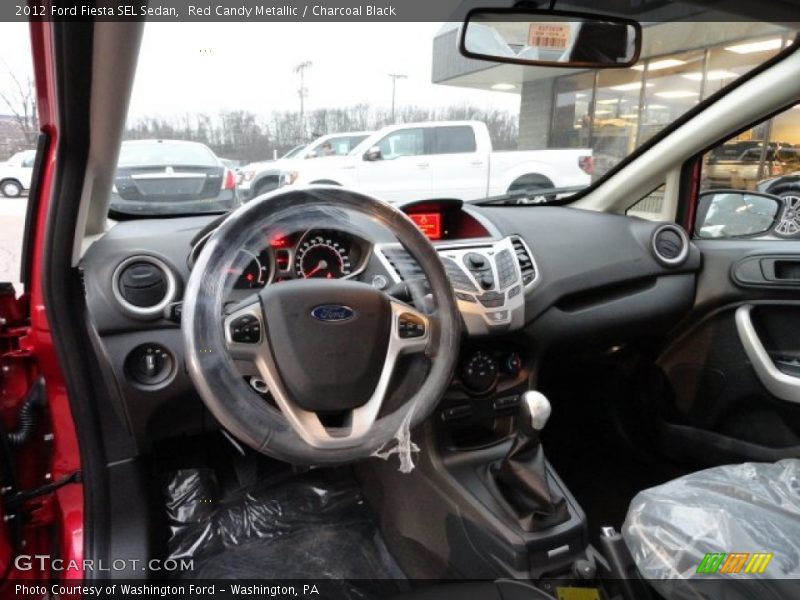 Red Candy Metallic / Charcoal Black 2012 Ford Fiesta SEL Sedan