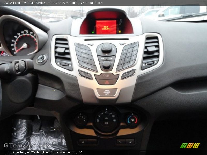 Red Candy Metallic / Charcoal Black 2012 Ford Fiesta SEL Sedan